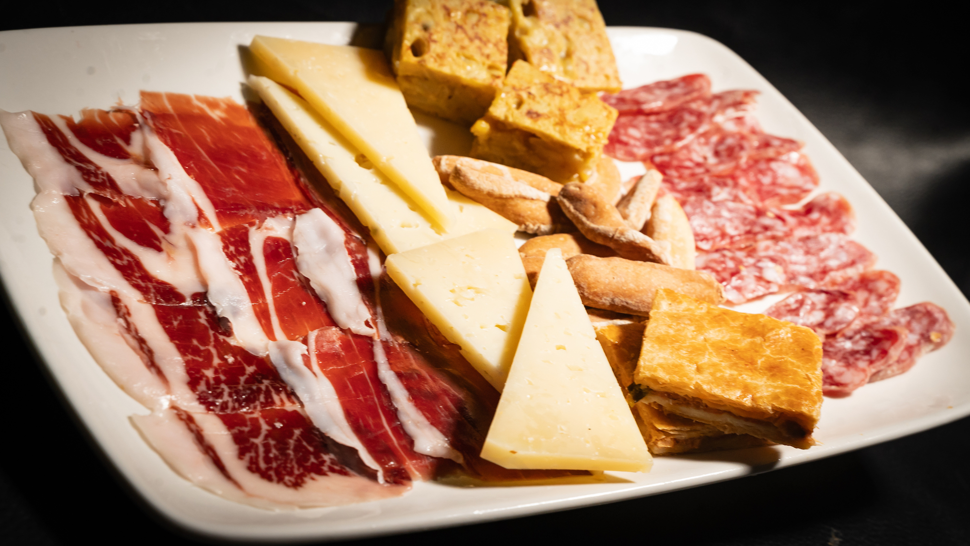 The Charm of Spanish Tapas: A Gastronomic Journey through Flavors and Traditions